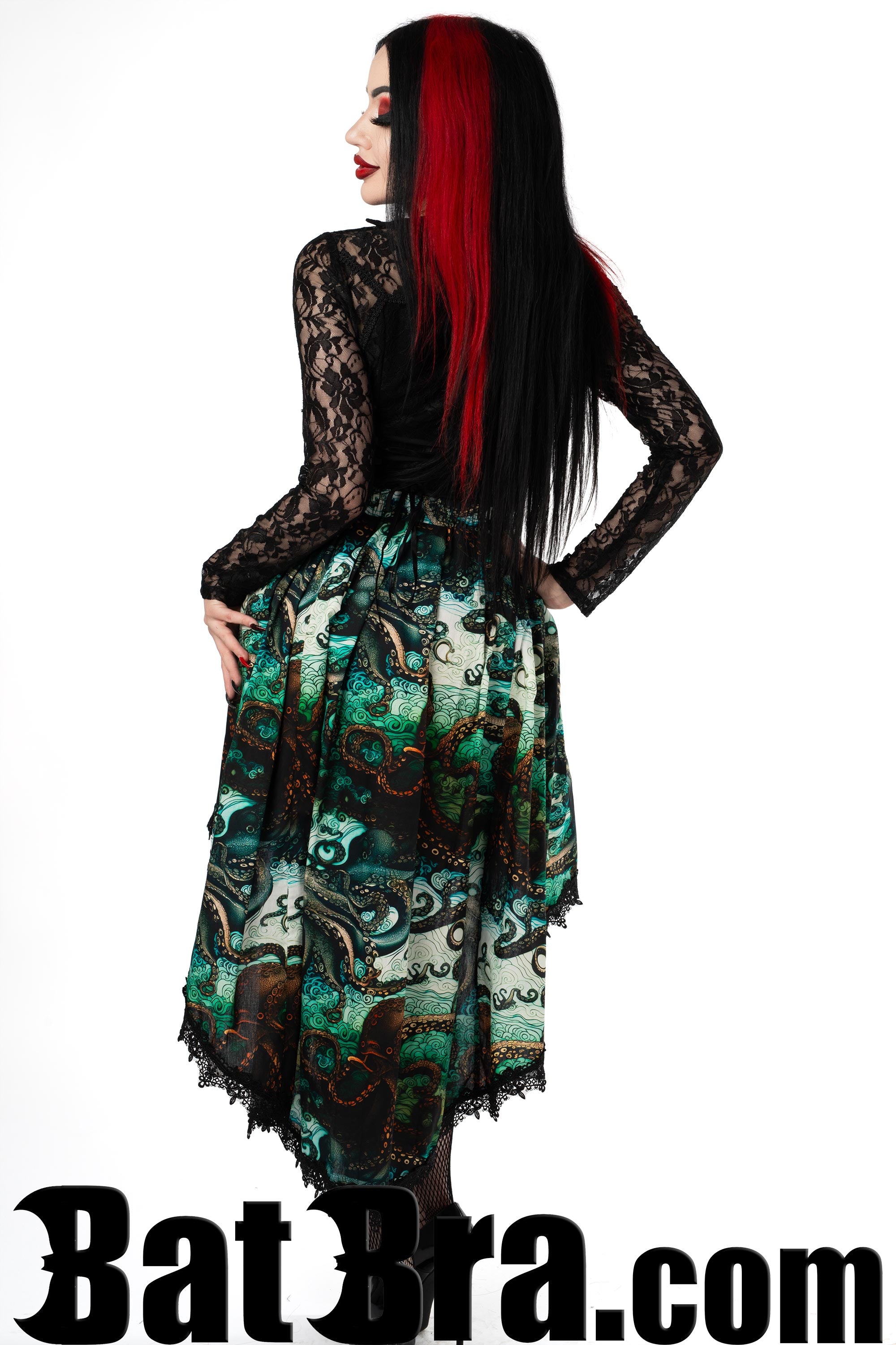 Back view of kraken inspired women's asymmetrical skirt showing longer back and black lace trim hem