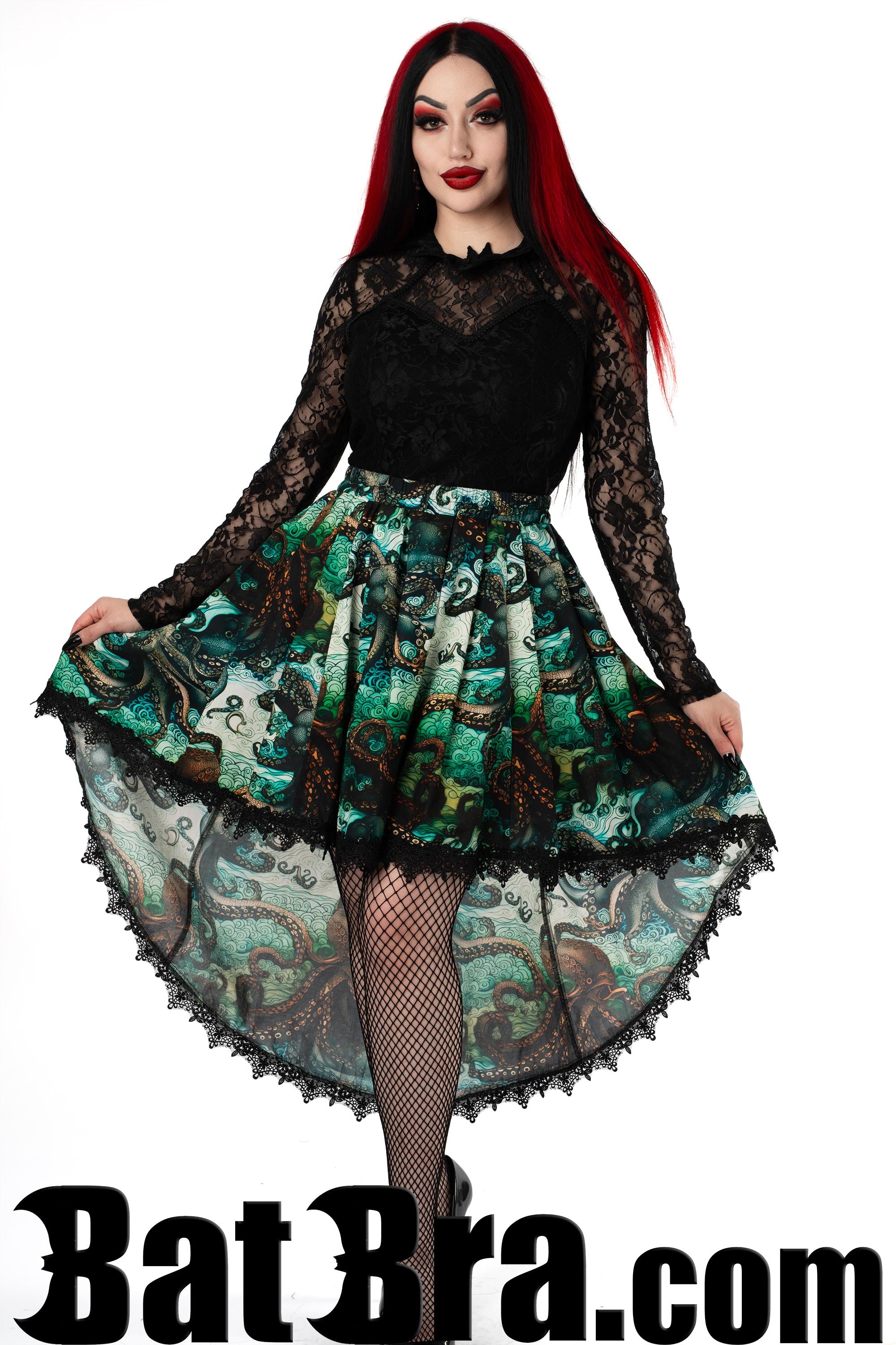 Women's asymmetrical skirt with black lace trim featuring green blue kraken inspired print