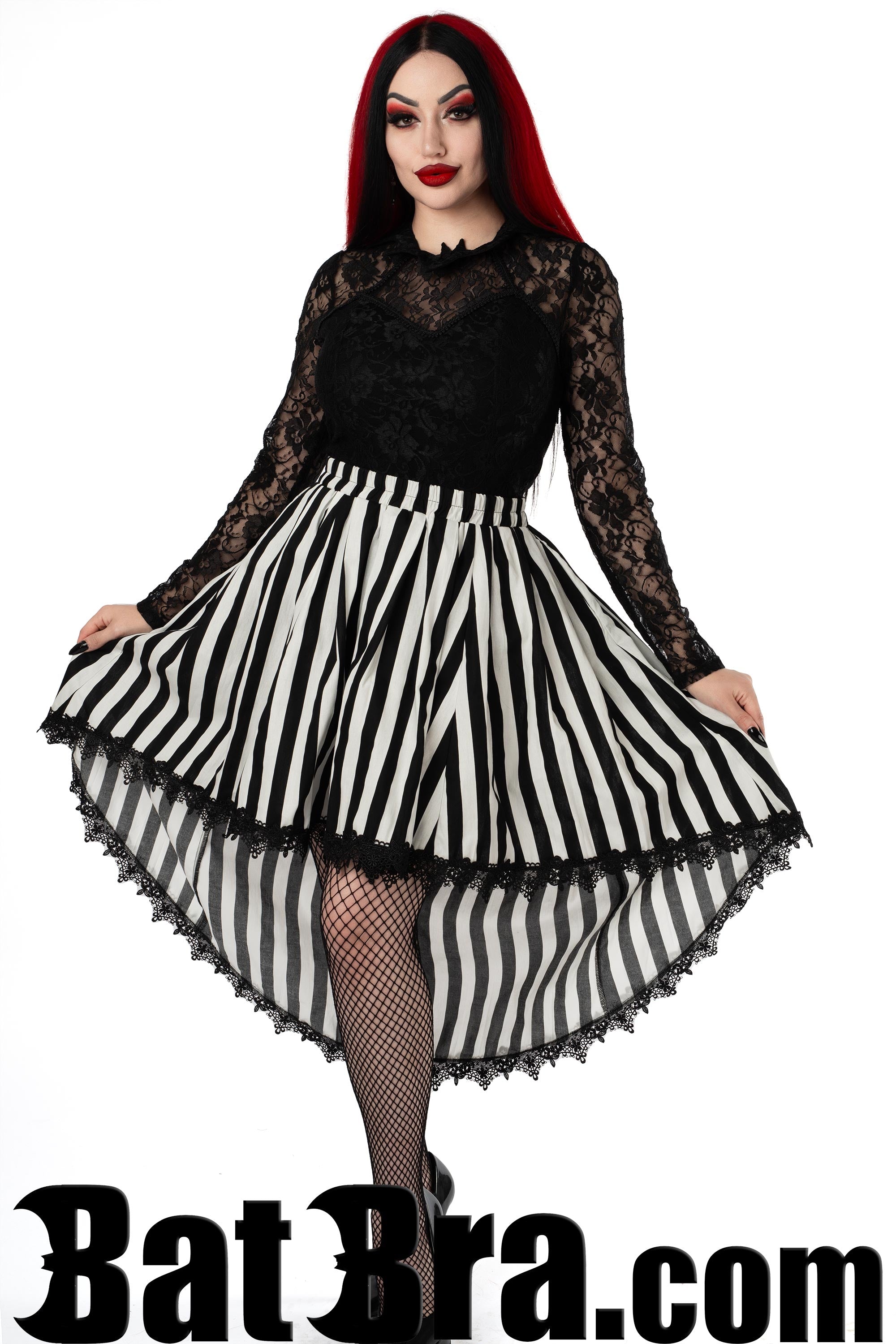 Women's black and white vertical striped skirt in asymmetrical high low style with black lace trim and elastic waist