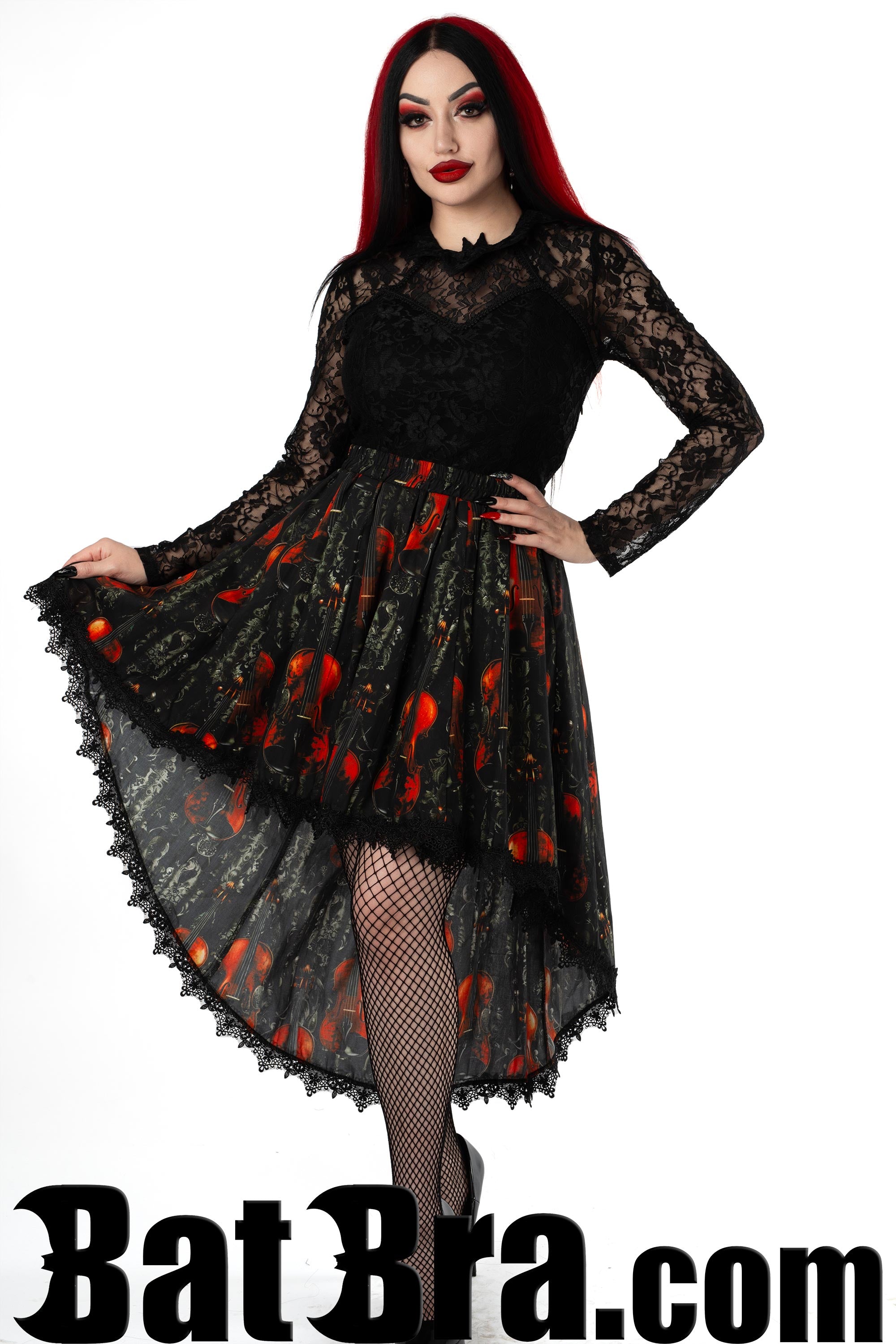 Women's black asymmetrical skirt with black lace trim and violin motif on the print